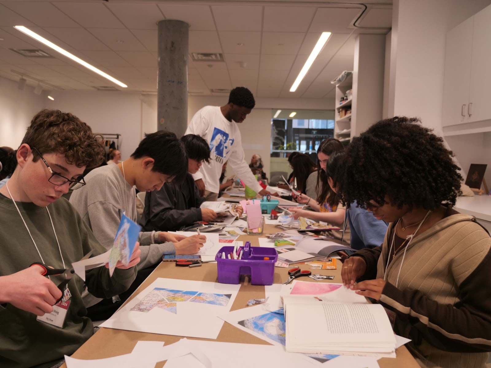 Students work with collage during the “Remapping Place” workshop at the Ottawa Art Gallery. 