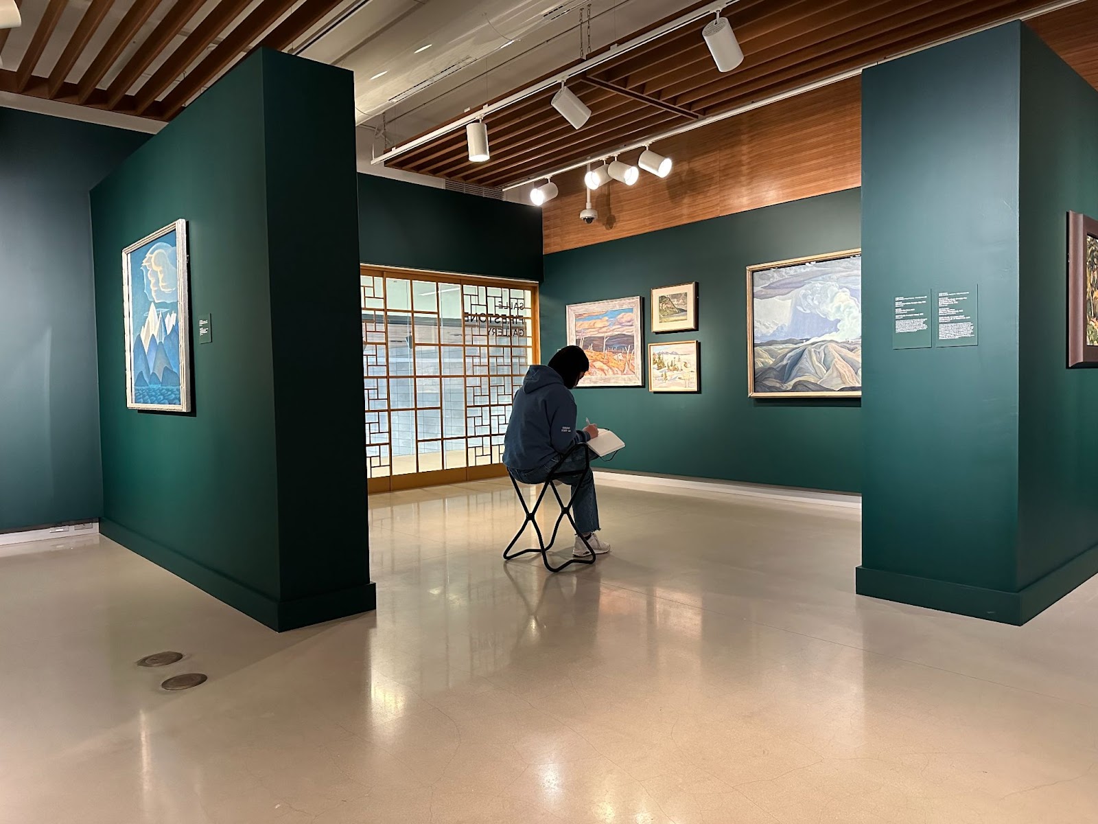 Students tour the Ottawa Art Gallery as a part of the Ekphrastic Writing Workshop. 