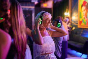 Happy woman at a silent disco