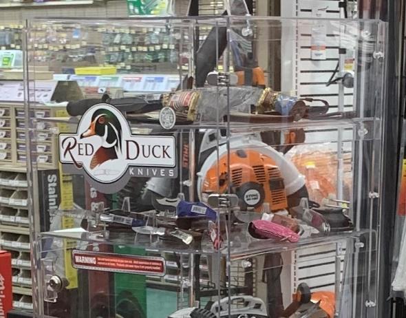 A display case with tools in it Description automatically generated