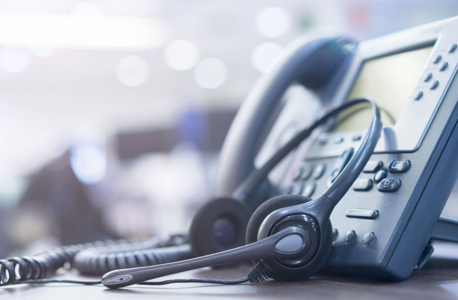 a close up of a phone and headset
