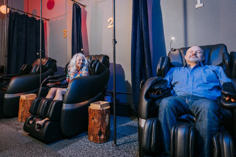 couple in the Relaxation Lounge for Zero Gravity Massage at Oakwell Beer Spa in Denver