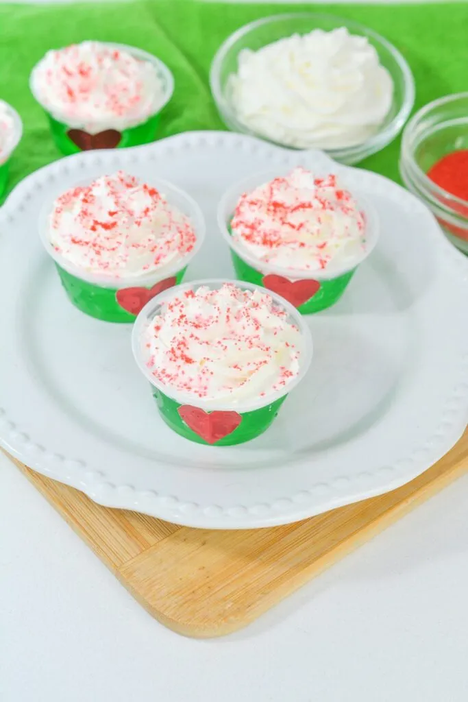 Grinch Keto Jello shots on white plate