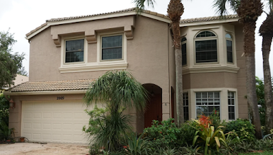 Figure 1 – The house I lived in at the time. All the windows on the second floor were hurricane glass.