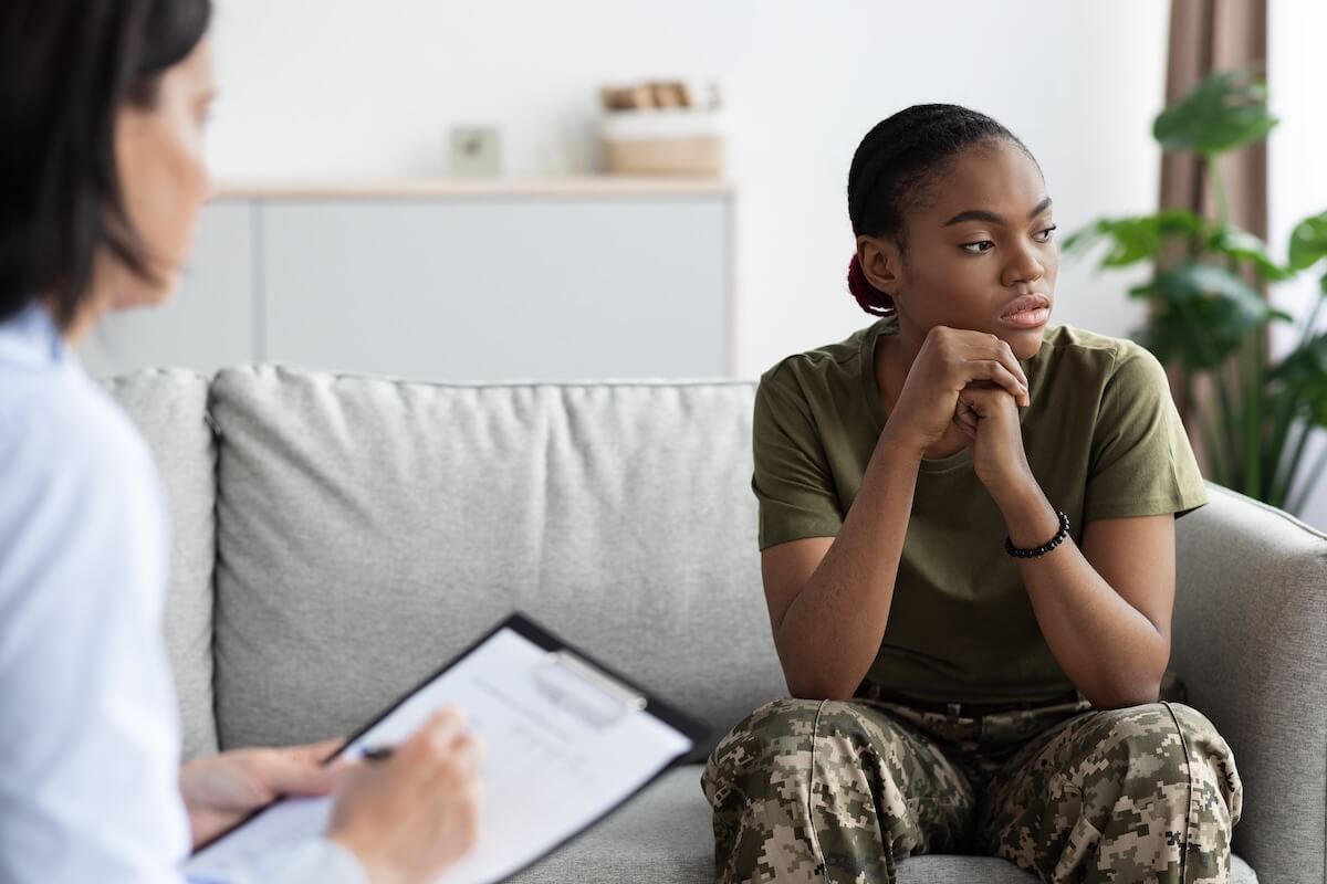 Reasonable accommodations for PTSD: soldier talking to a therapist