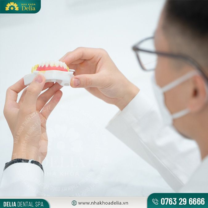 Bọc răng sứ bị đau có thể là do lấy dấu hàm không chuẩn