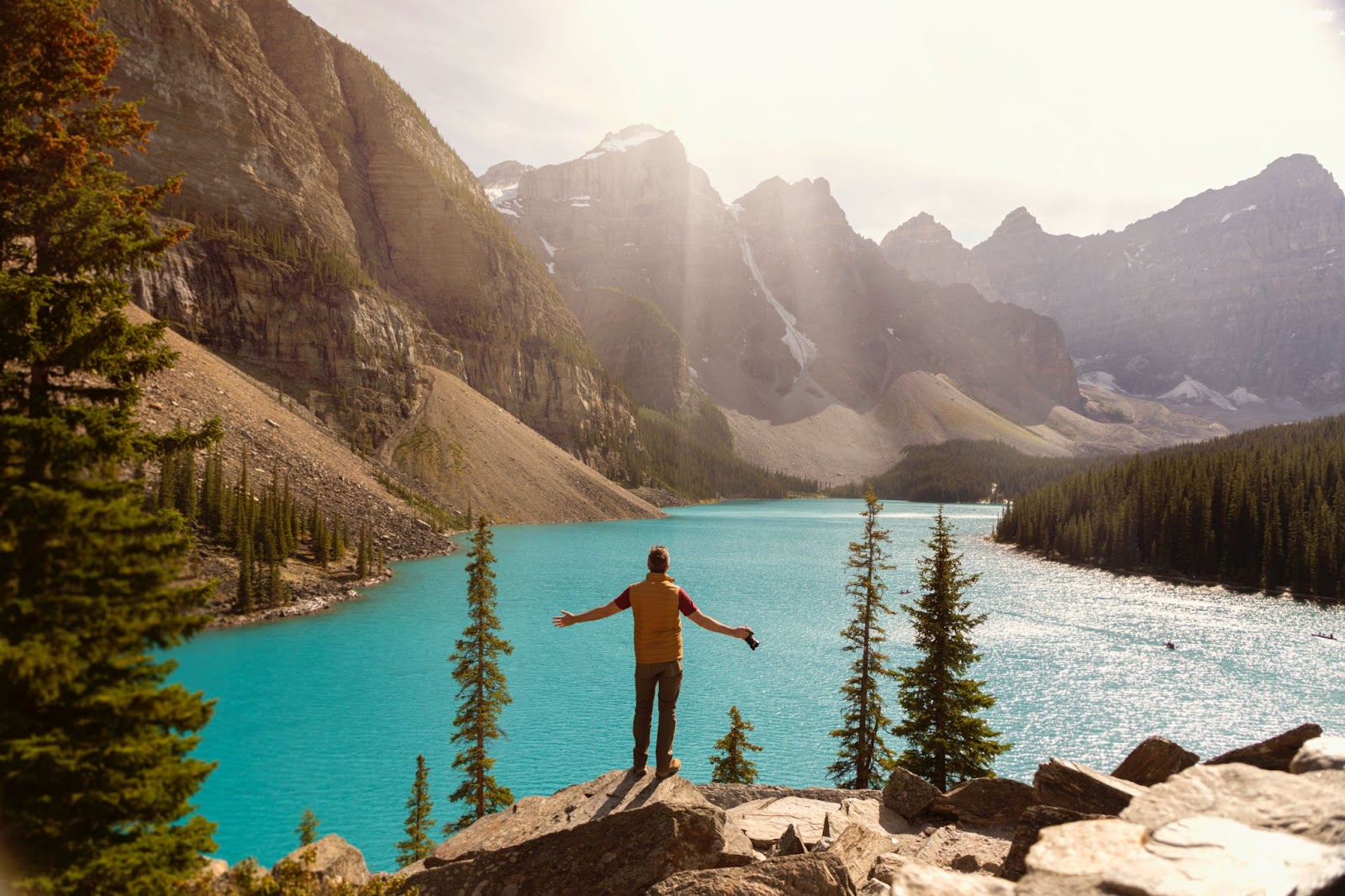 A man overlooking Lake Louise in Alberta, Canada