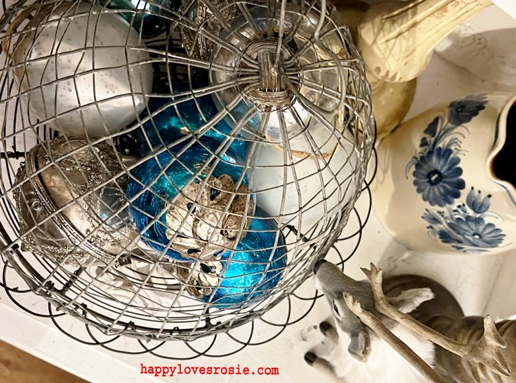 wire cake stand with vintage baubles and Jugs
