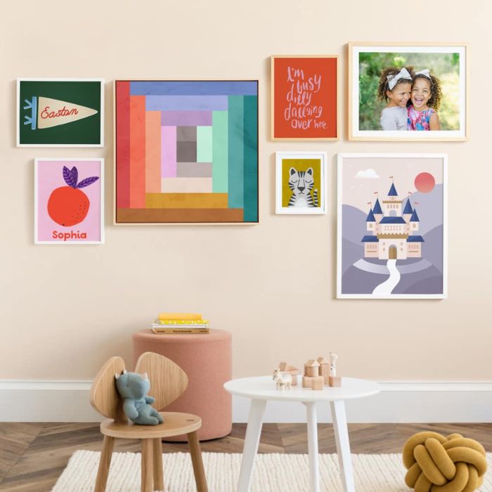 nursery wall filled with minted art prints