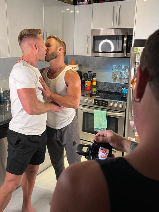 Sumner Blayne and Bruce Jones making out in the kitchen for their scene for Squirt Studios