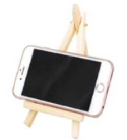 A cell phone on a small wooden easel</p>
<p>Description automatically generated