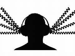 A silhouette of a person wearing headphones

Description automatically generated