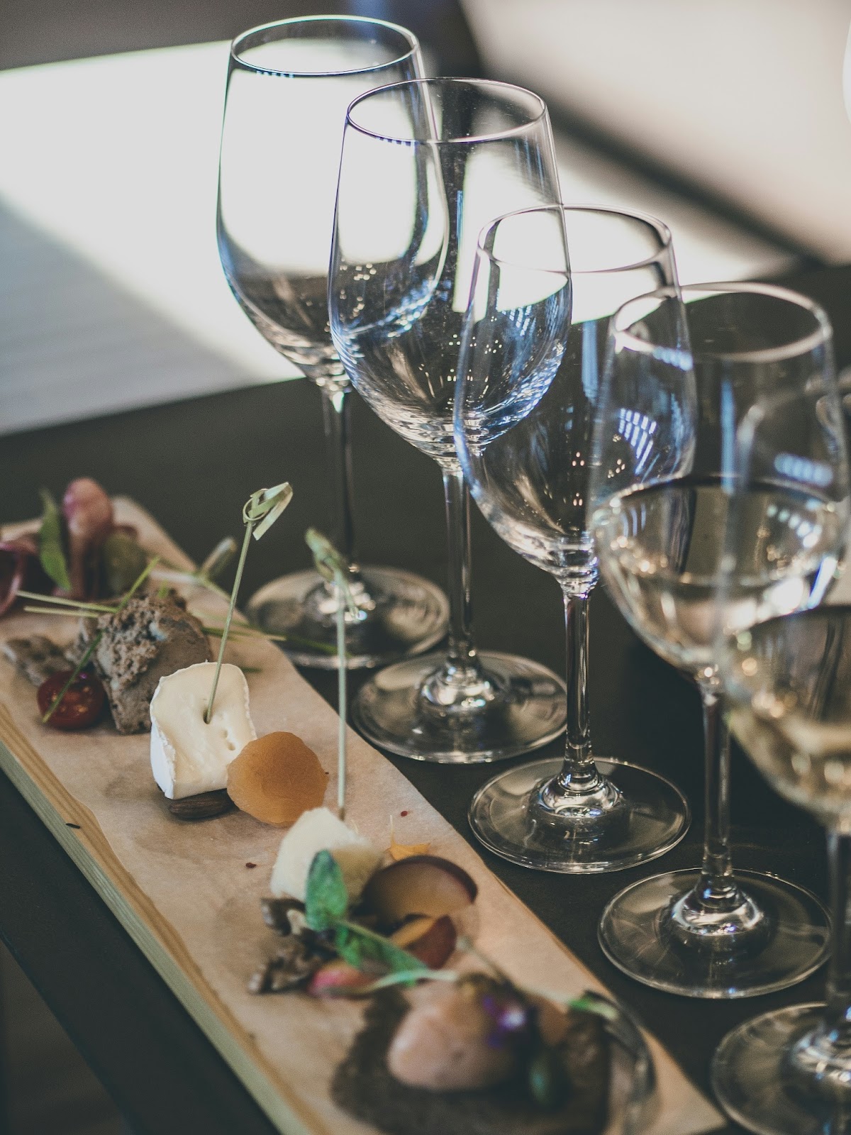 Visitors enjoying a wine tasting session at a picturesque Provencal winery.