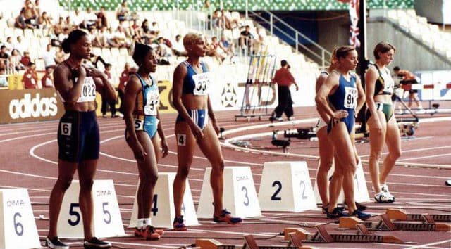 spotcovery-Marion Jones standing on the 6th lane