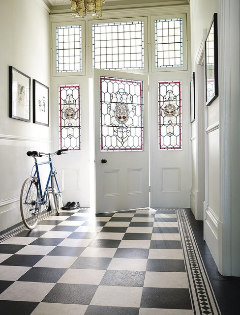 Checkerboard flooring design with distinctive border styles