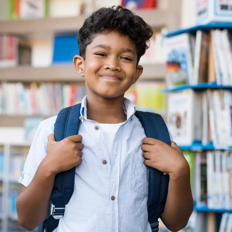 Picture of a young boy rocking the curly pompadour