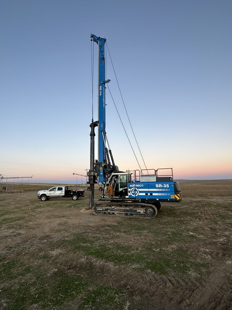 Heavy equipment machine for drilling