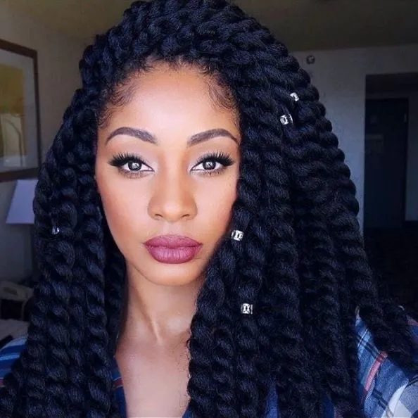 Full view of a lady rocking Crochet Jumbo Twists