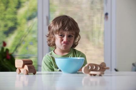 https://novakdjokovicfoundation.org/wp-content/uploads/2016/07/cute-little-boy-frowning-over-his-meal-while-playing-with-toys-bad-behavior-eating-habbits.jpg