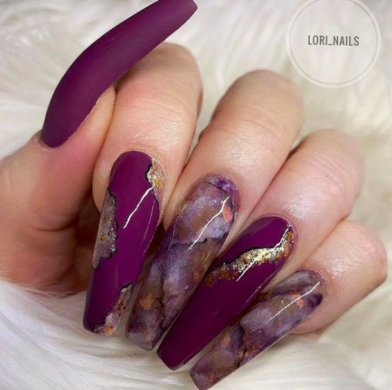 Picture a purple marble nail with accents