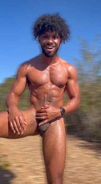 Tony Genius outside naked pissing all over his abdomen