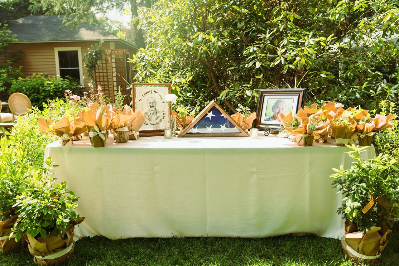 Memorial table at backyard wedding