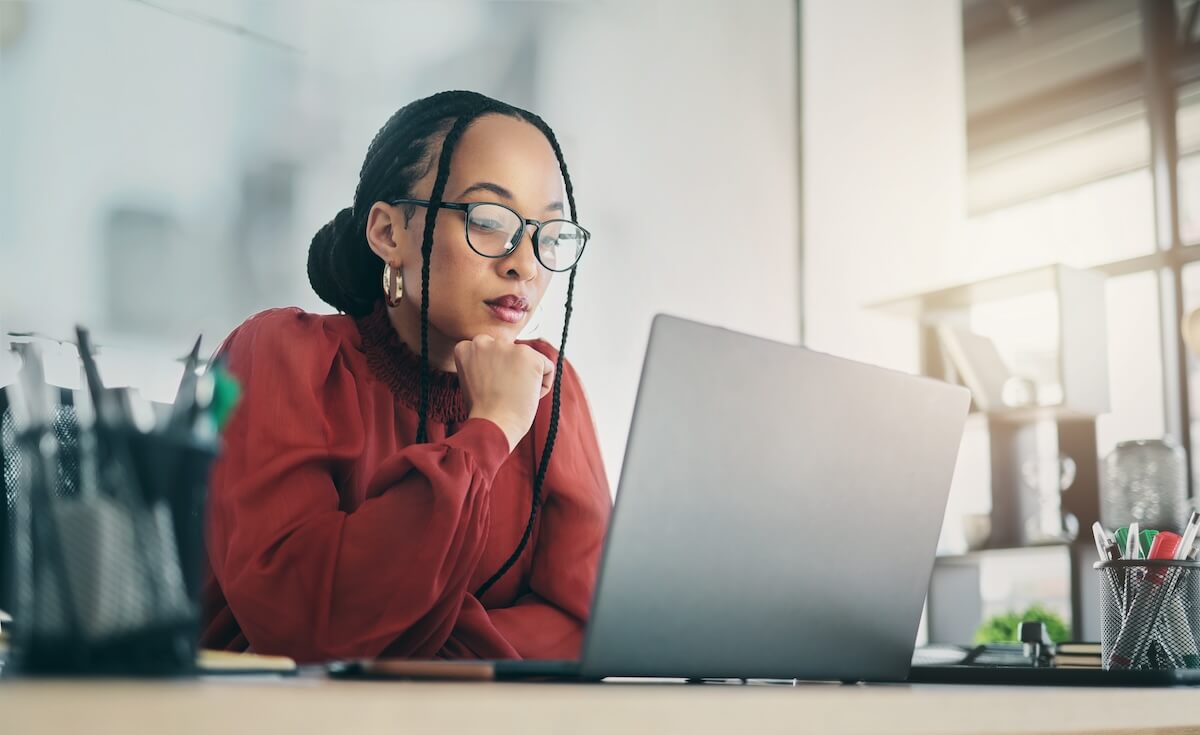 Manager looking at her laptop