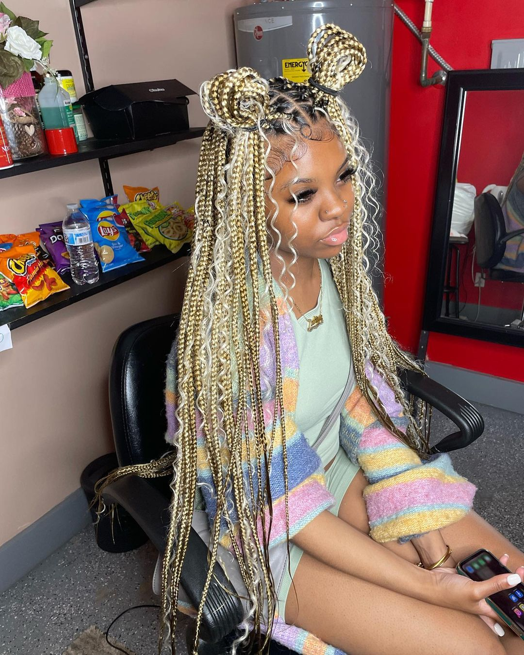 lady at a salon rocking boho knotless braids 