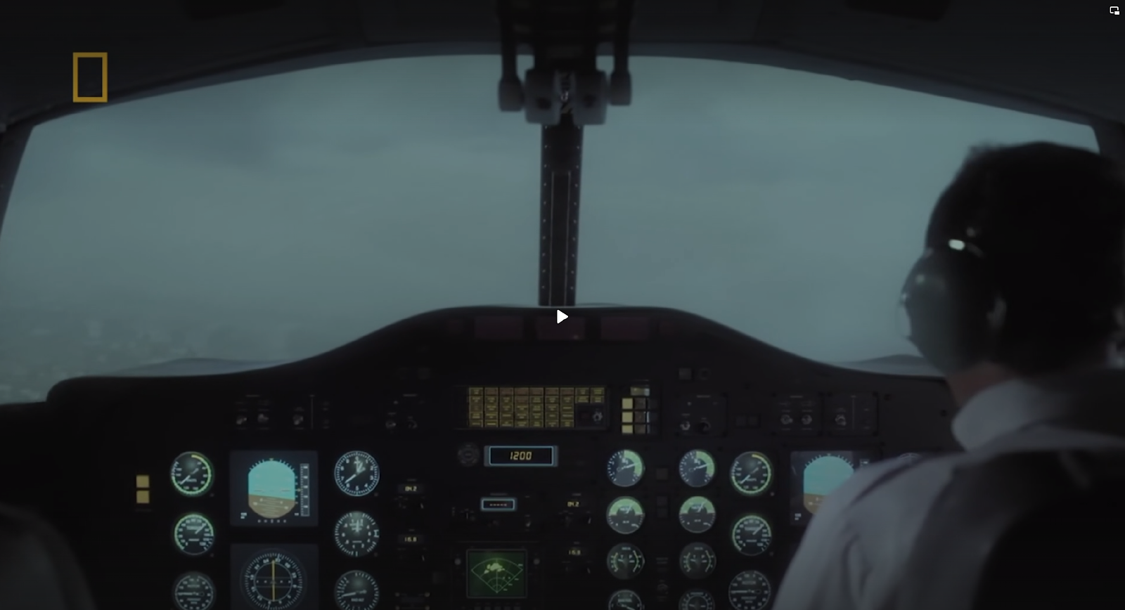 A picture containing flight instruments, pilot, transport, cockpit

Description automatically generated