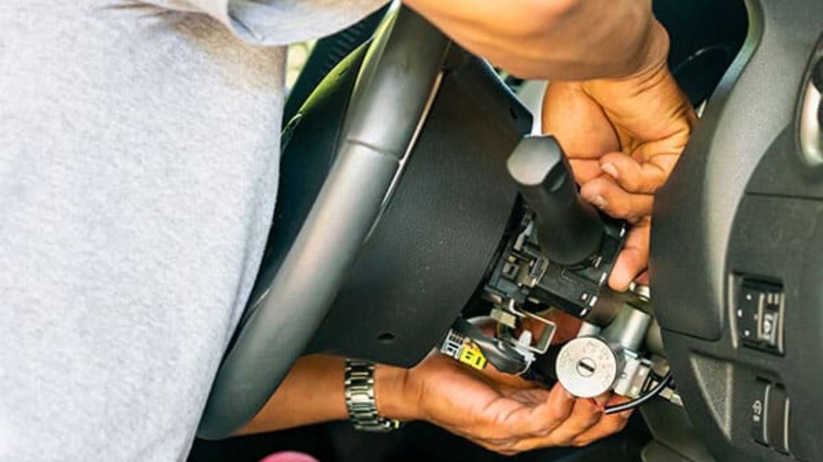 A locksmith doing ignition repair