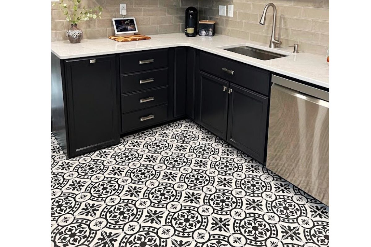 black cabinets with black and white tile
