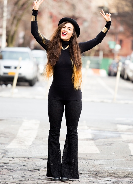 Lady shows off her monochromatic outfit paired with the fashion acccessory