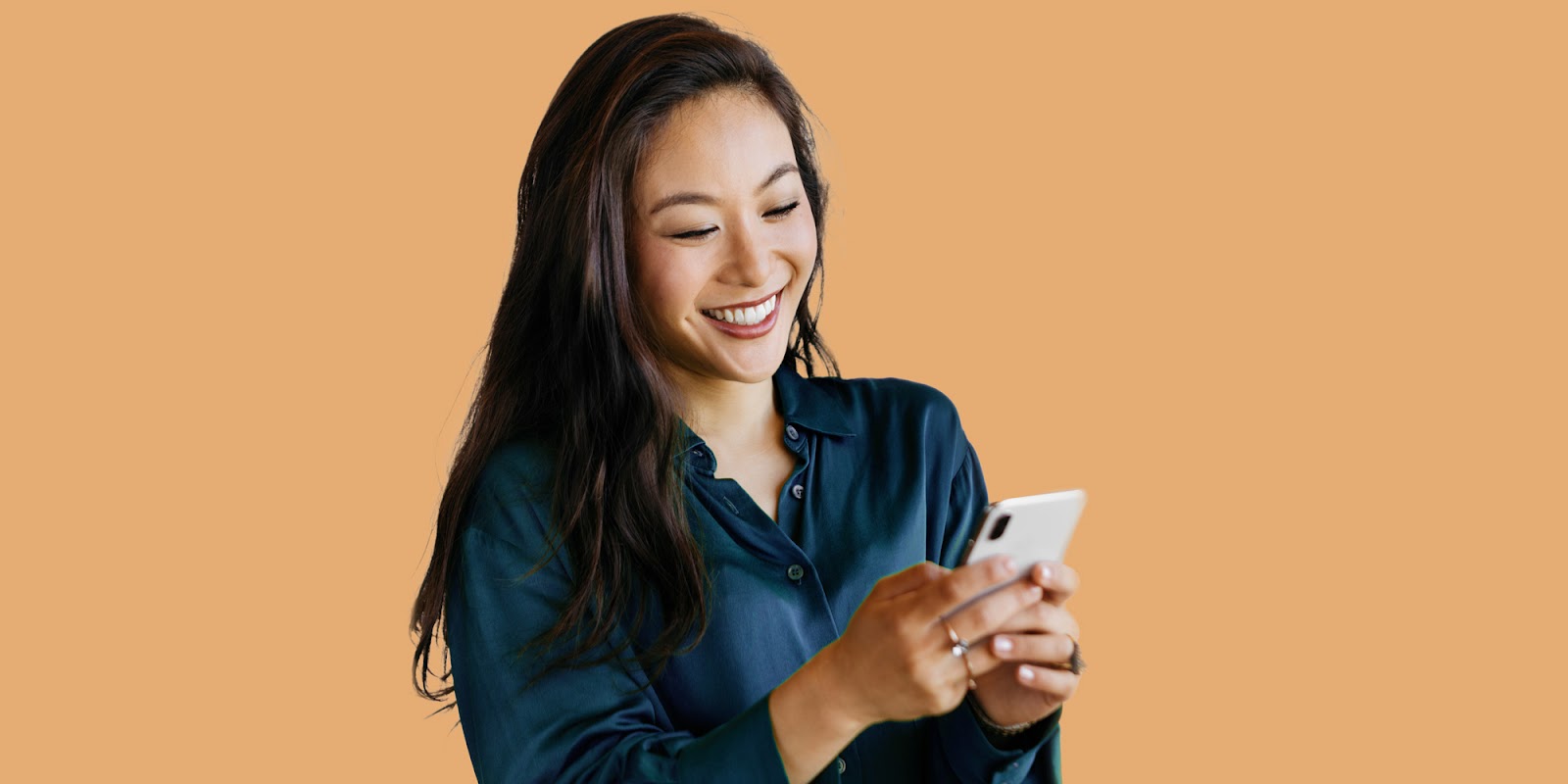 Graphic of a woman texting on an orange background