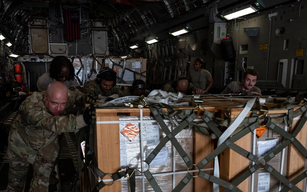 15th AS (Airlift Squadron) USAF delivering military equipment to the SNA.