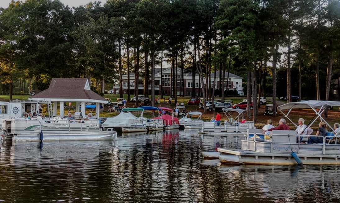 Boats on Lake Trace, at Carolina Trace Neighborhood, a luxurious place to live in Sanford NC