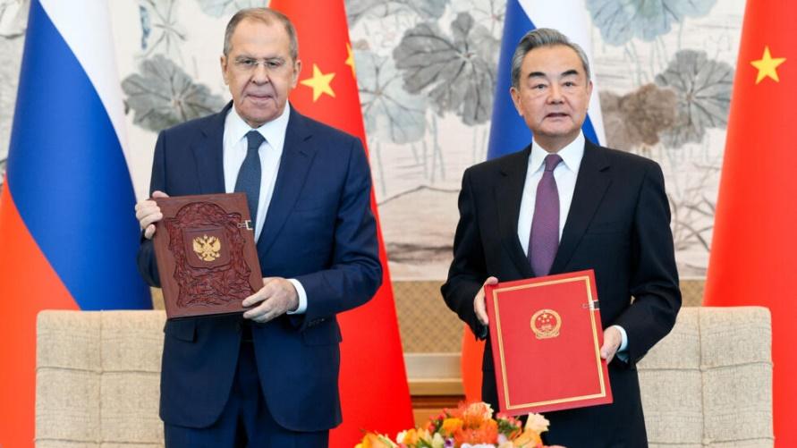 Russia's Foreign Minister Sergei Lavrov and China's Foreign Minister Wang Yi attend a signing ceremony in Beijing, China April 9, 2024