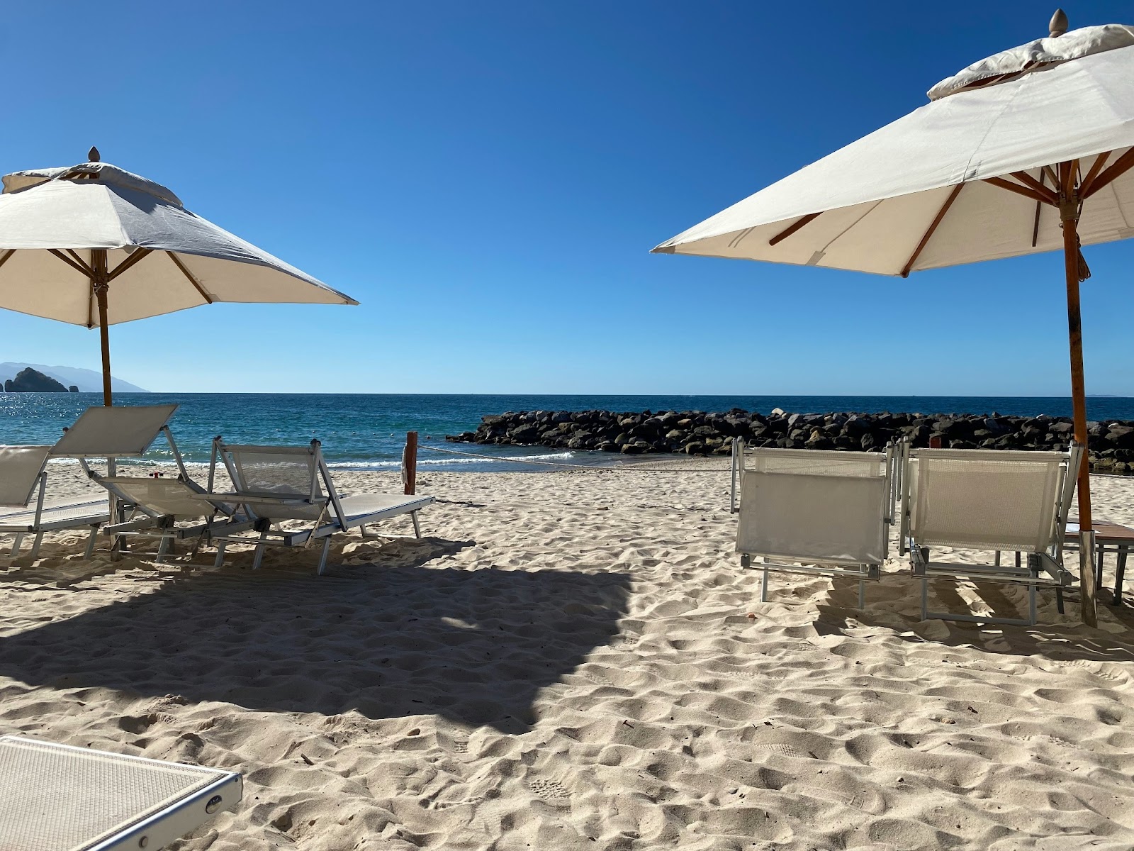 A secluded beach in Puerto Vallarta, surrounded by crystal-clear waters.