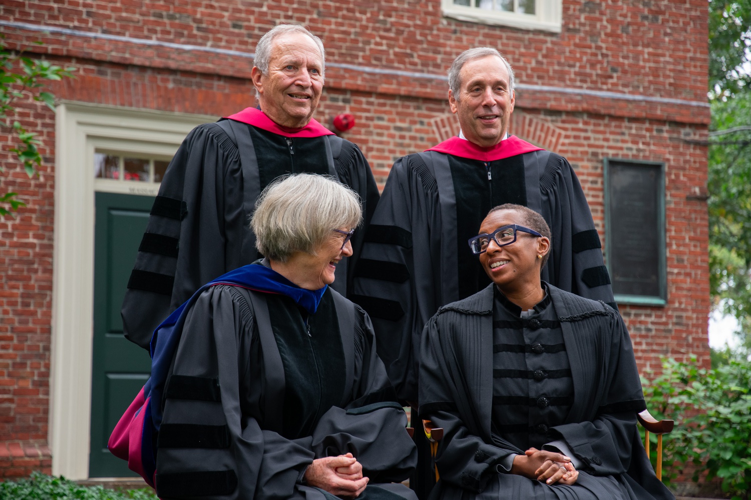 Pictured from top to bottom, left to right: Former Harvard Presidents Lawrence H. Summers, Lawrence S. Bacow, and Drew Gilpin Faust, and current University President Claudine Gay sit in front of Massachusetts Hall.