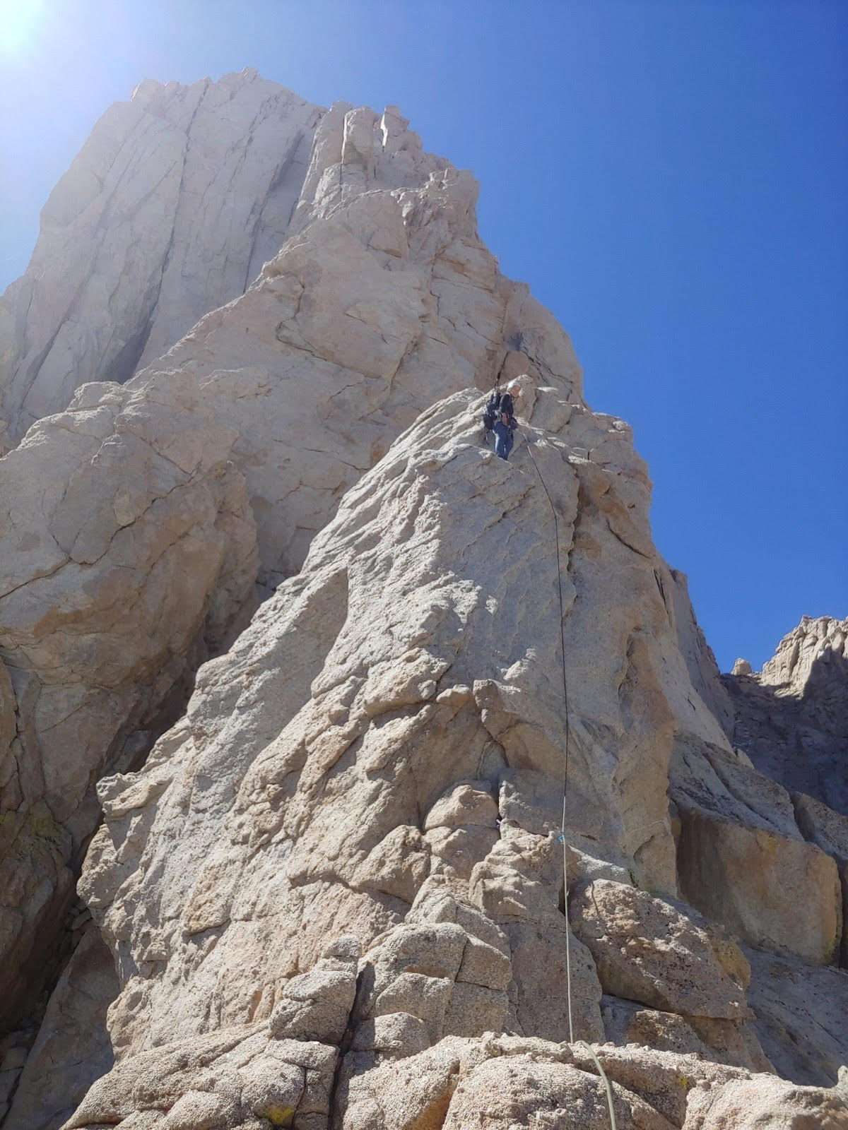A photo of me after sending the crux pitch on the East Buttress of Mount Whitney