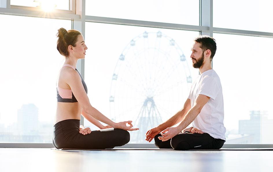 Couples doing yoga together