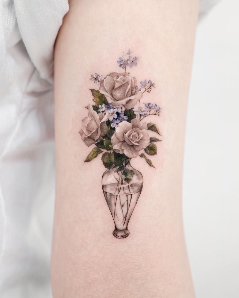 Flowers tattoo done by Dong Hwa Kim