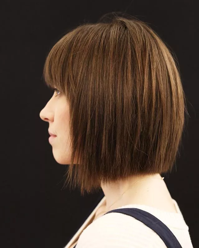 Side view of a lady wearing  her Soft Undercut