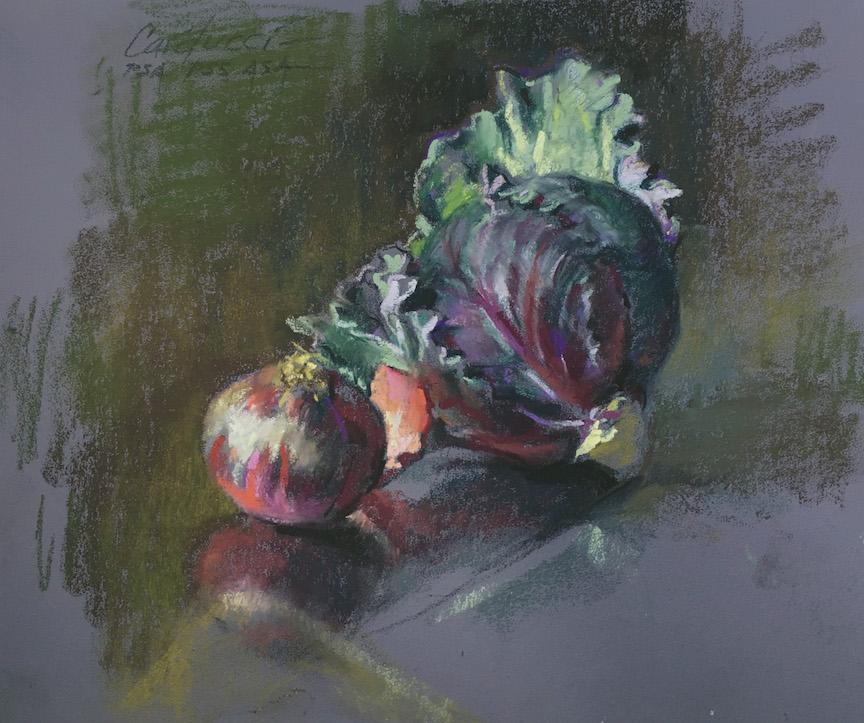A pastel of vegetables on a table

Description automatically generated