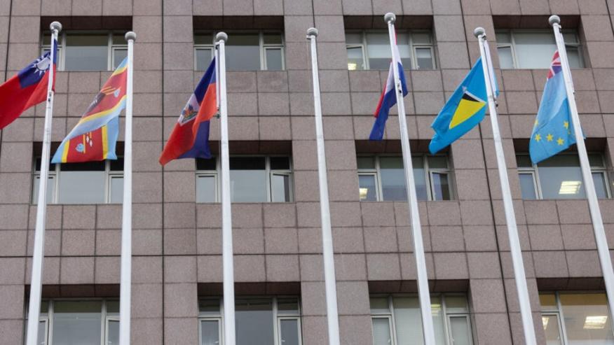 An empty flag pole where Nauru's flag used to fly is pictured next to flags of other countries at the Diplomatic Quarter which houses embassies in Taipei, Taiwan January 15, 2024