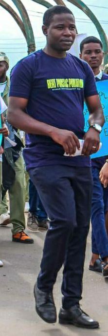 A person in a blue shirt

Description automatically generated