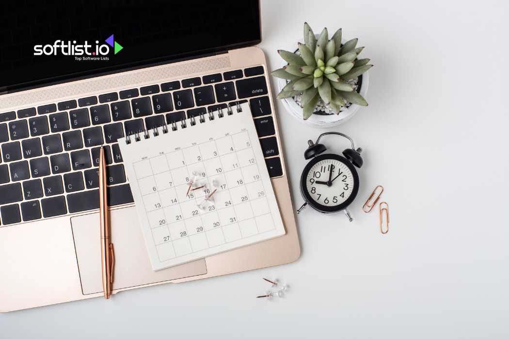 Alarm clock and calendar on wooden desk