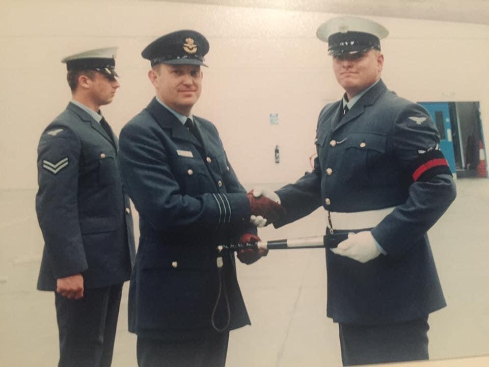 A photo of Alex Smith in his military uniform with two fellow RAF members. 