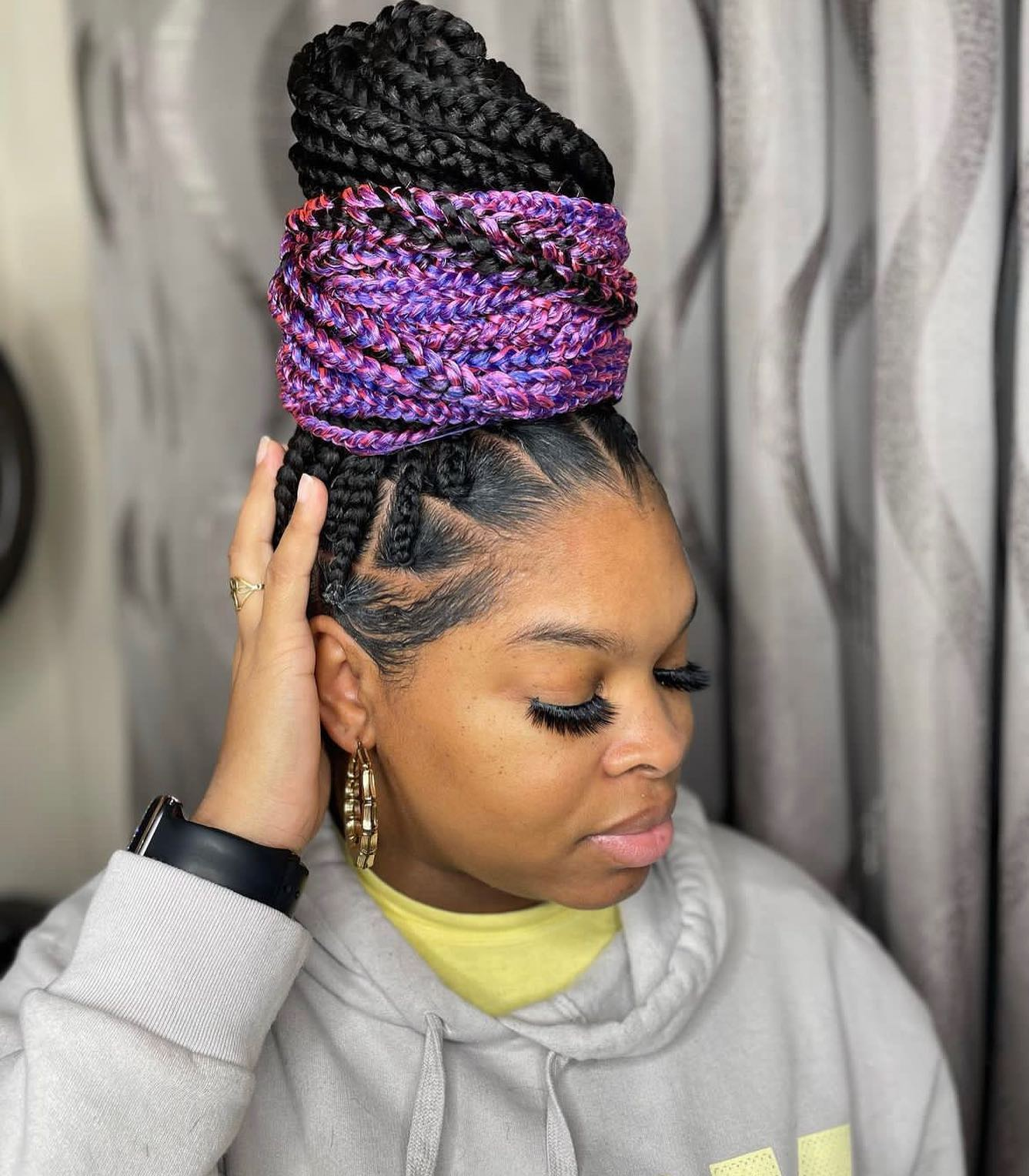 Purple and Black Box Braids in Braided Bun