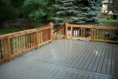 wood railing with composite deck and stairs custom built michigan