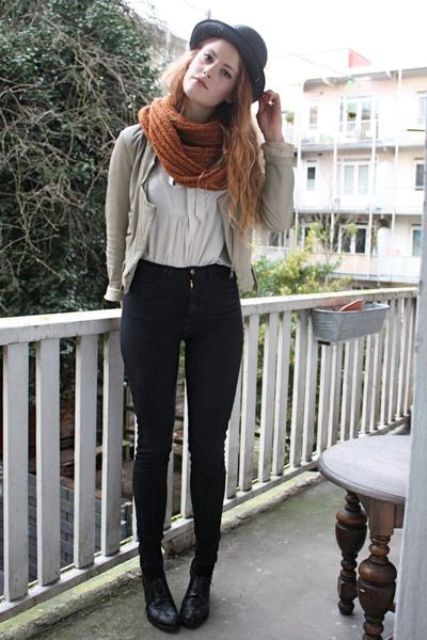 Picture of lady pairing her bowler hat with scarf